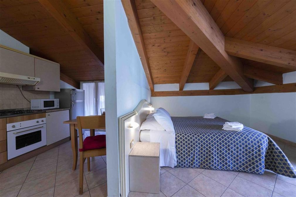 Aparthotel Residenza Melucci Rimini Camera foto